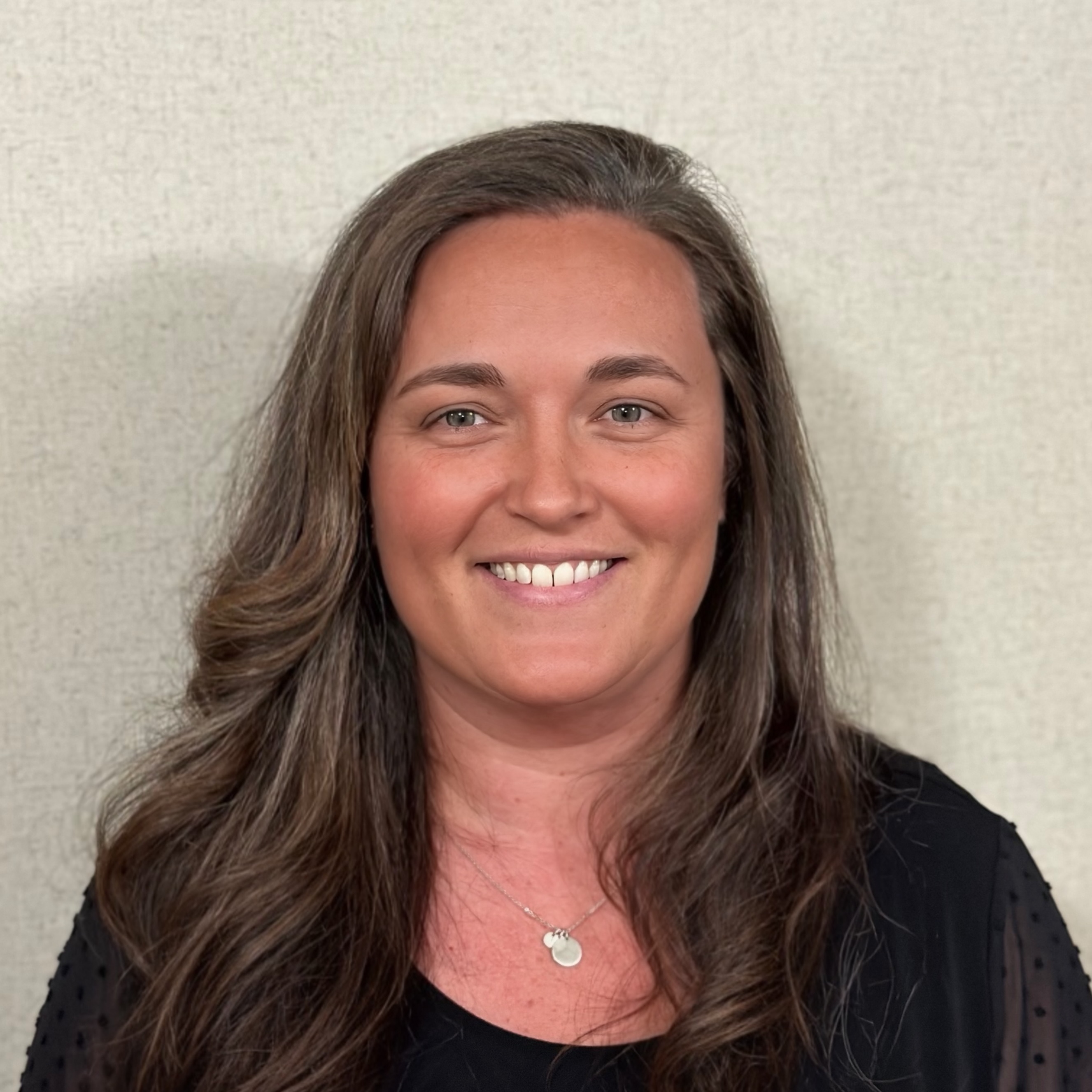 Selfie of a woman uploaded to HeadshotPro AI headshot generator