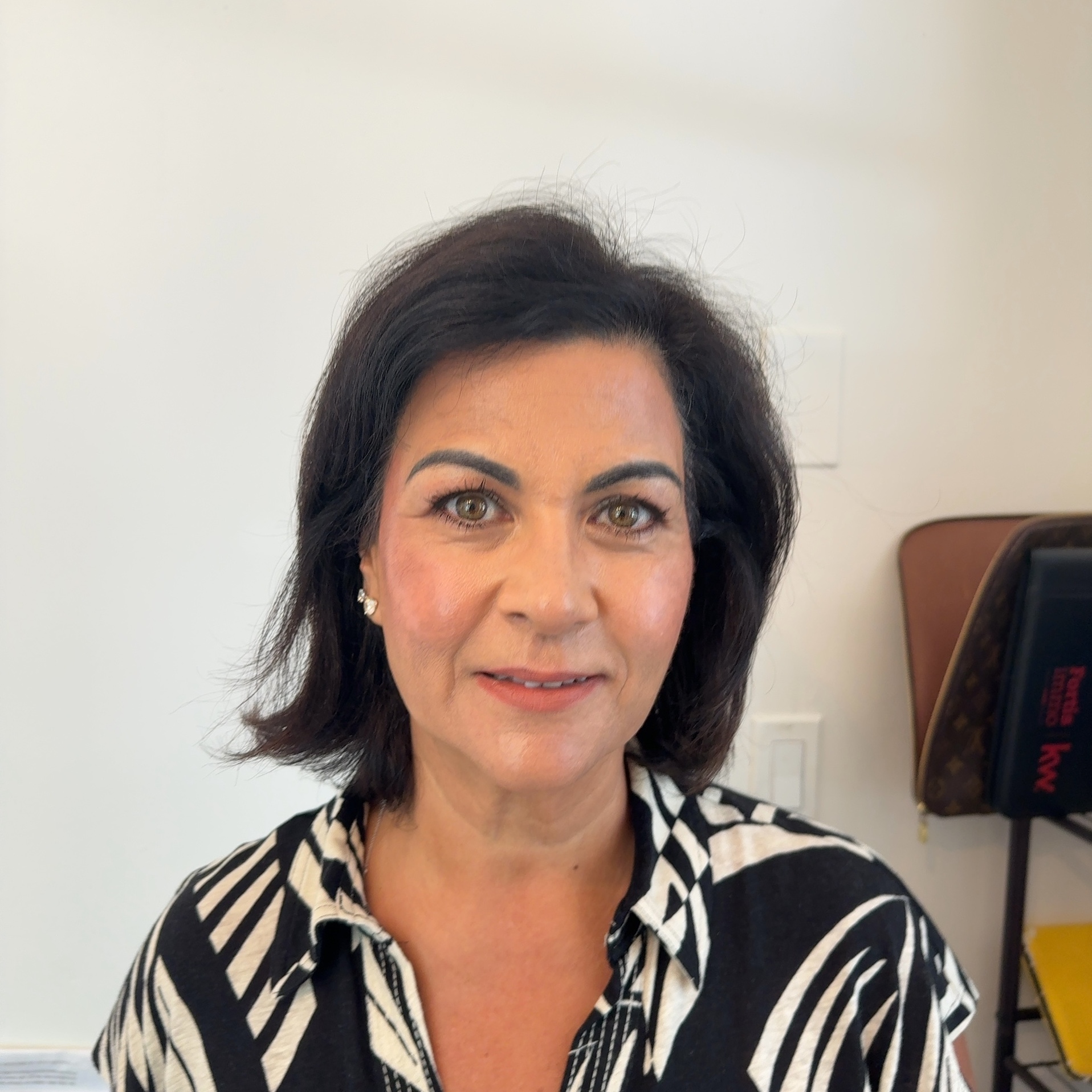 Selfie of a woman uploaded to HeadshotPro AI headshot generator