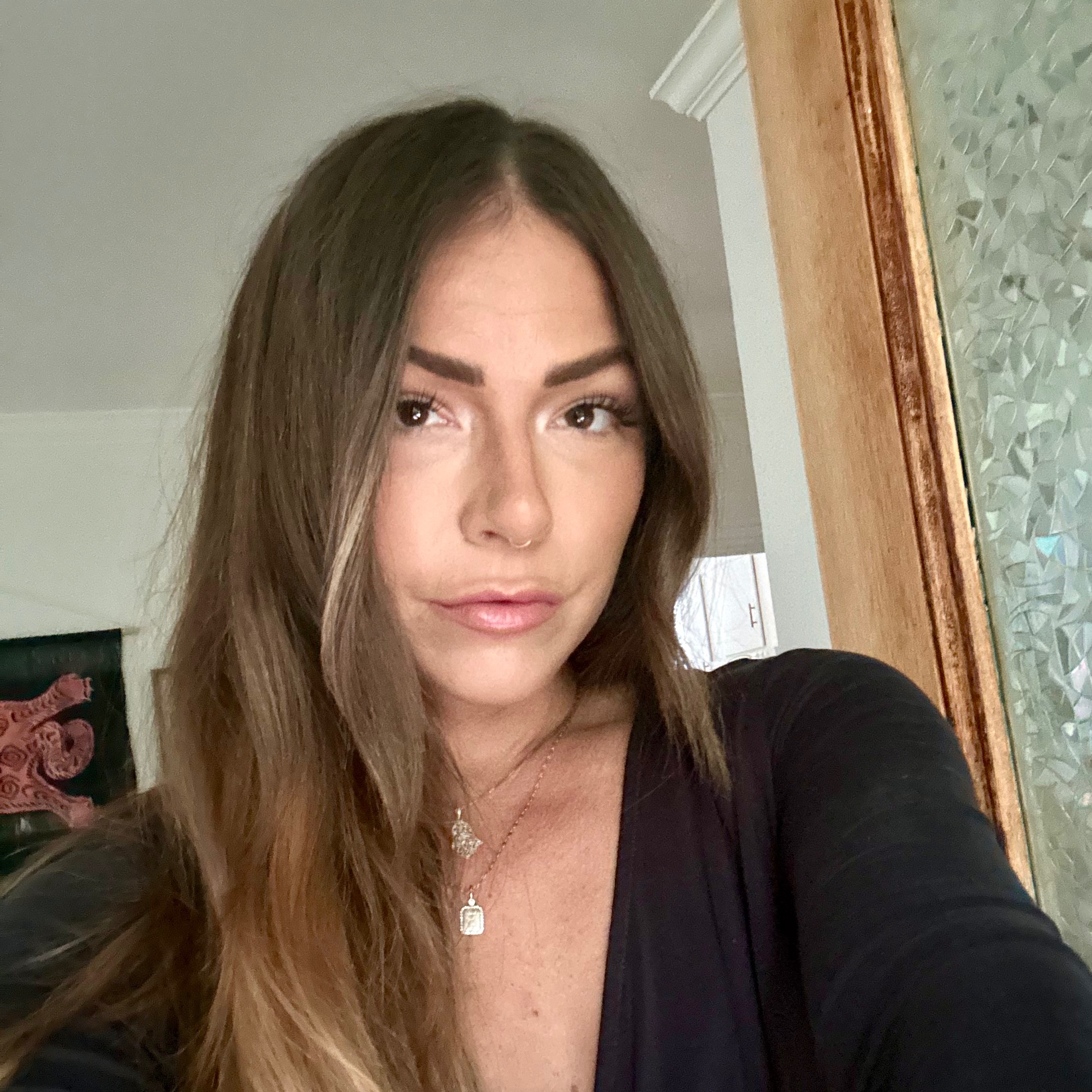 Selfie of a woman uploaded to HeadshotPro AI headshot generator