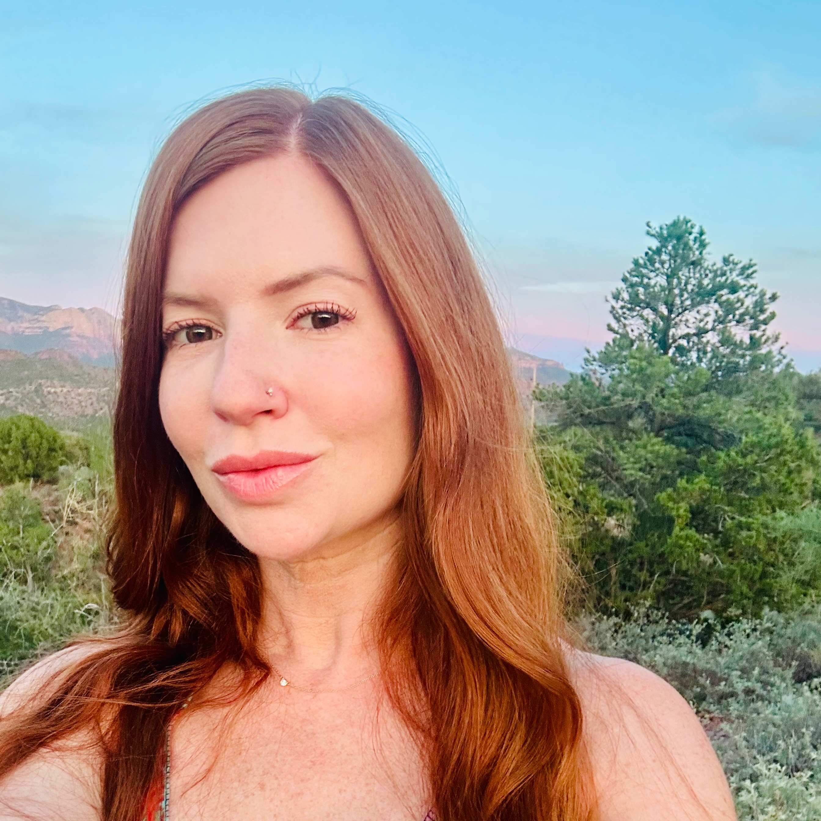 Selfie of a woman uploaded to HeadshotPro AI headshot generator