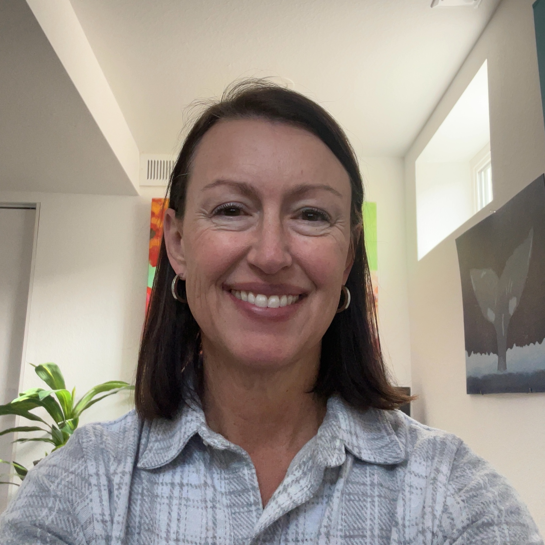 Selfie of a woman uploaded to HeadshotPro AI headshot generator