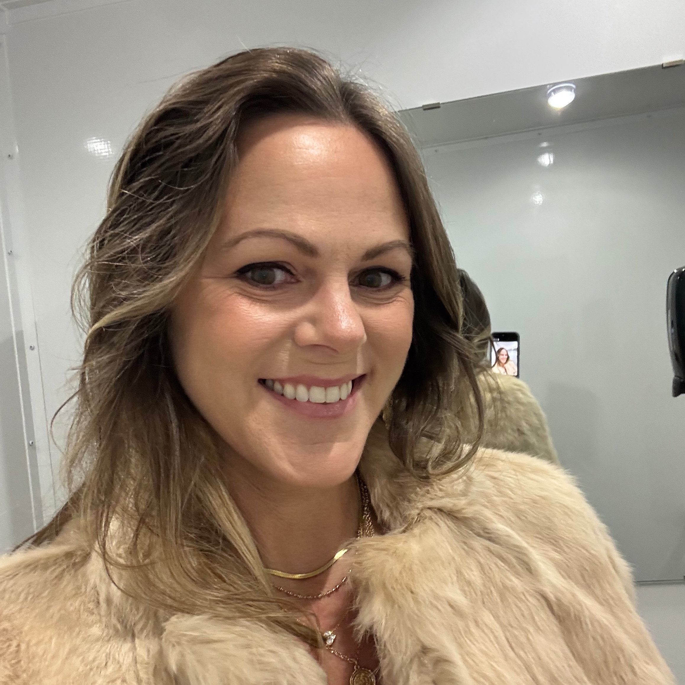 Selfie of a woman uploaded to HeadshotPro AI headshot generator