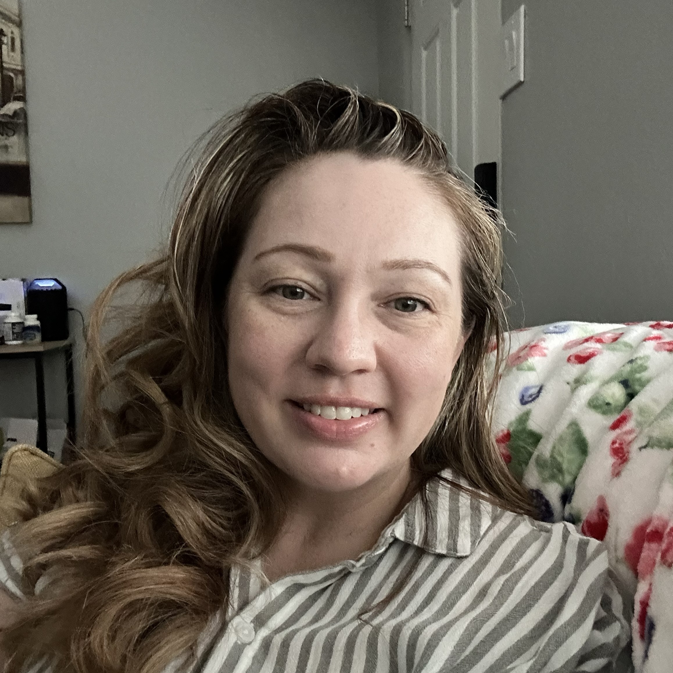 Selfie of a woman uploaded to HeadshotPro AI headshot generator